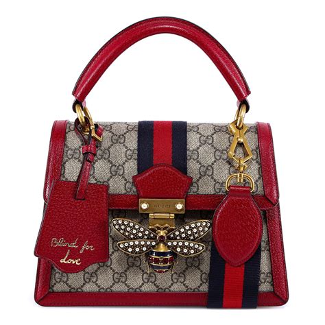 gucci bag with bee clasp.